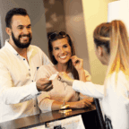 Receptionist upselling the spa to hotel guests