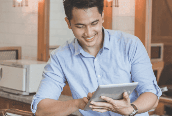 Salon owner enjoying 24/7 salon and spa software support