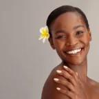 Smiling business owner after starting a massage business in 10 steps